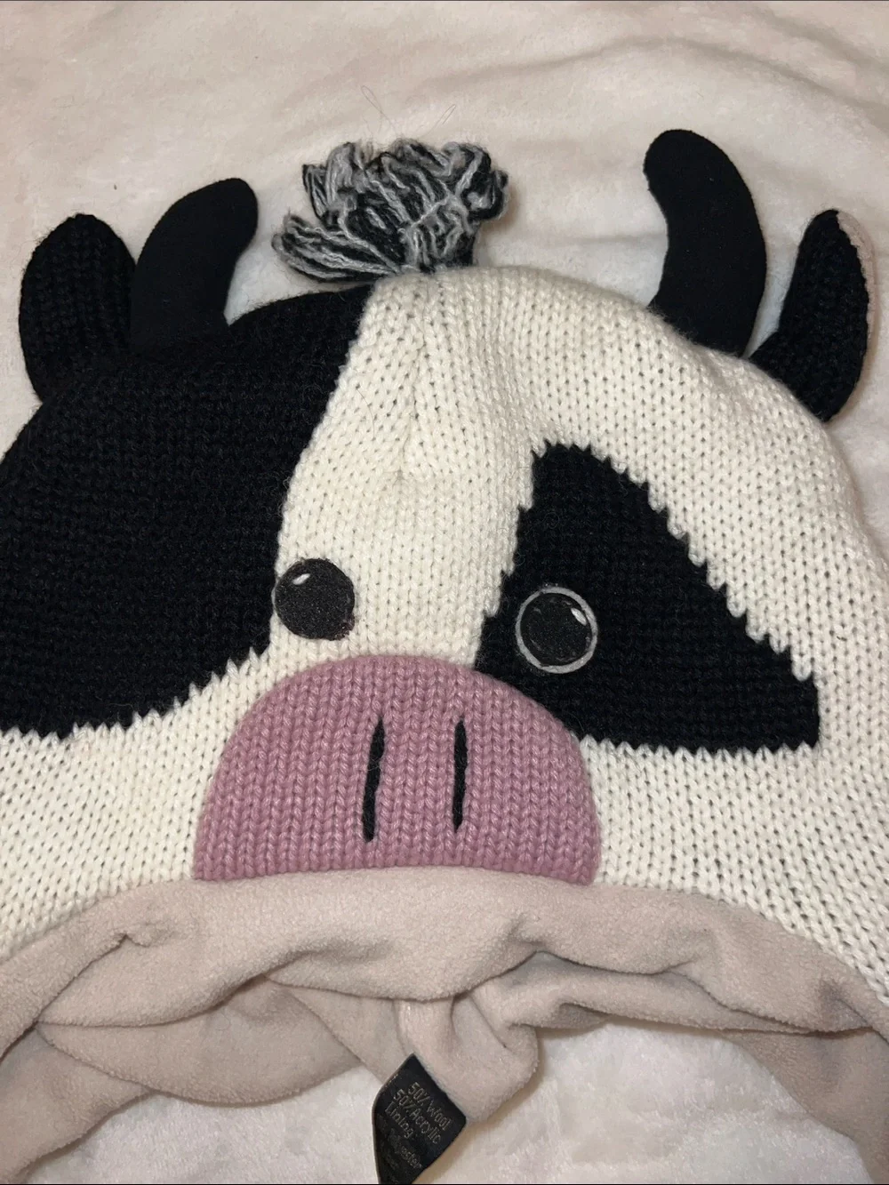 Kyber outerwear Kids Cow Earflap Hat - Black, White & Pink